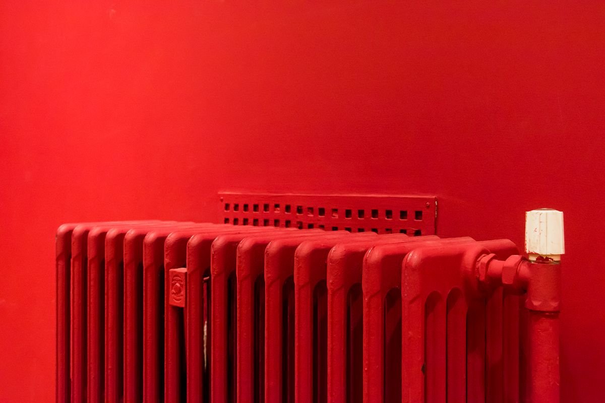 Radiateur à inertie fluide et fonte